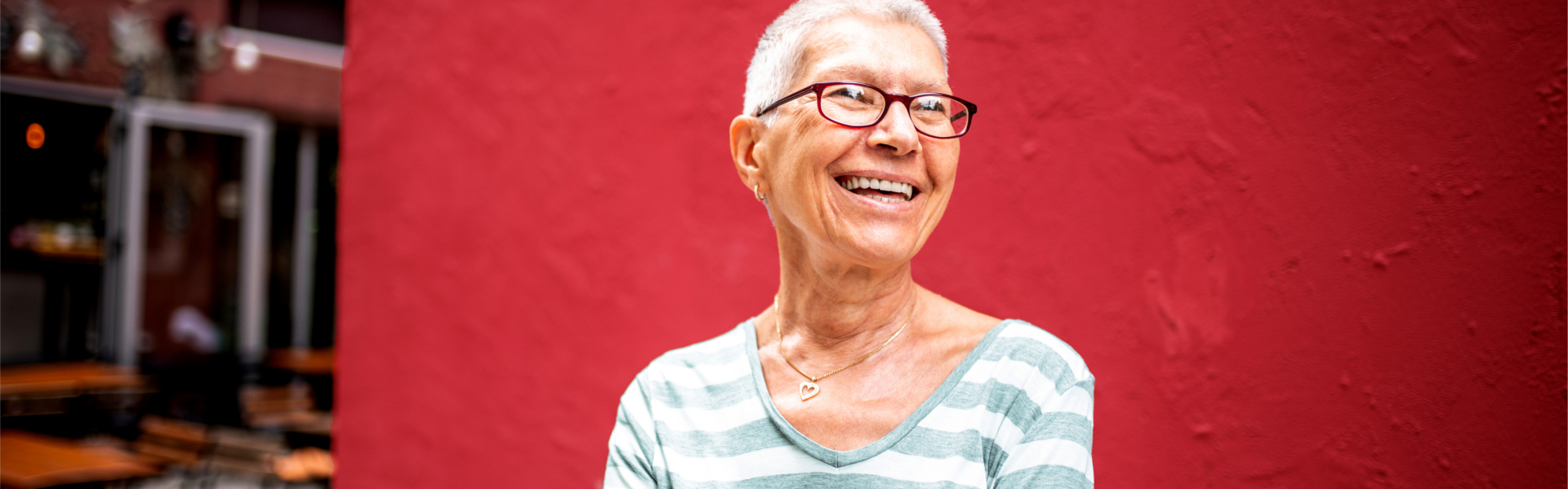 An older woman smiling.      