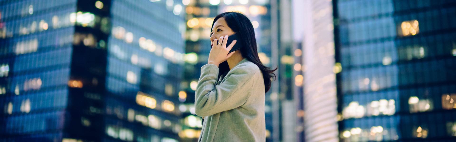 A woman is talking on her phone.